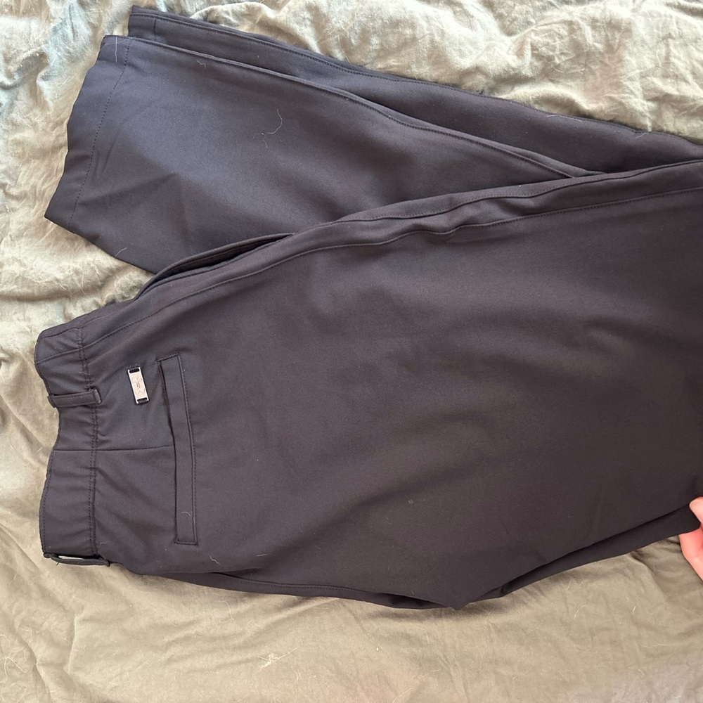 Women’s size 4 under Armour, golf pants.